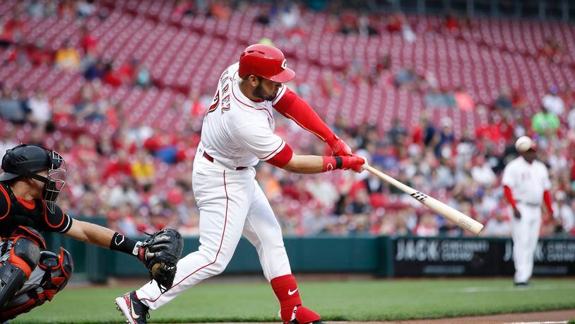 CINCINNATI, OH - MAY 04: Eugenio Suarez #7 of the Cincinnati Reds hits a three-run home run in the first inning of a game against the Miami Marlins at Great American Ball Park on May 4, 2018 in Cincinnati, Ohio. (Photo by Joe Robbins/Getty Images)