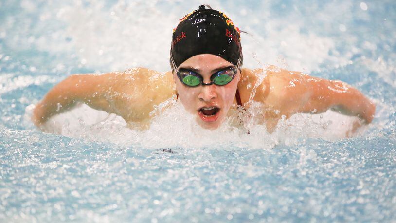 Lauren Olsen of Bishop Fenwick competes in the 100 yard butterfly during the preliminary rounds of the 33rd annual Southwest Ohio Swimming Officials Association Classic held at the Countryside YMCA in Lebanon, Saturday, Jan. 16, 2016. GREG LYNCH / STAFF