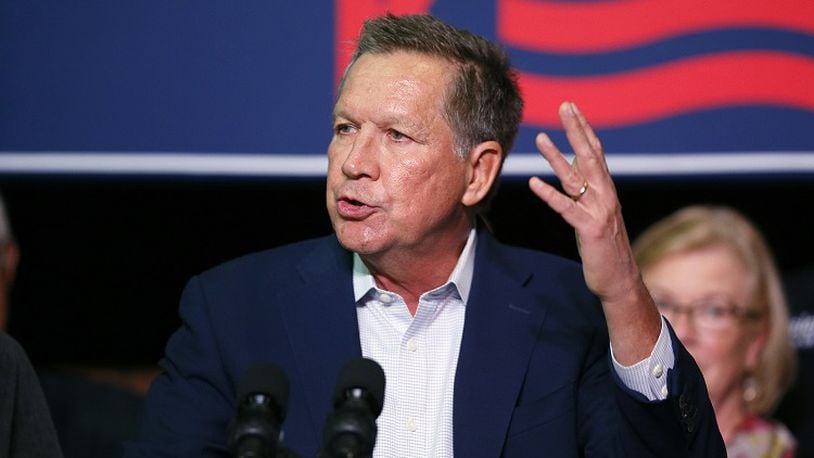 Republican presidential candidate Ohio Gov. John Kasich speaks to supporters during a rally at Everal Barn & Homestead in Westerville, Ohio, Tuesday, Oct. 27, 2015. Kasich plans to attend the third Republican presidential debate that takes place Wednesday night in Boulder, Colo. (Kyle Robertson/The Columbus Dispatch via AP) MANDATORY CREDIT