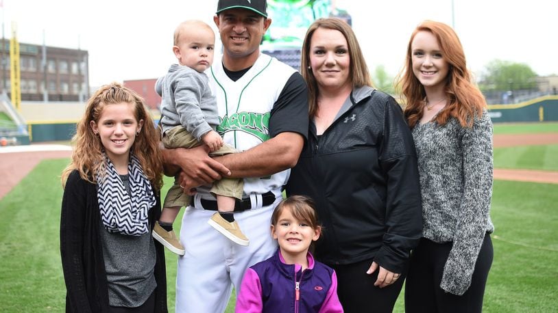 Dragons first-base coach Luis Bolivar and his family: Zoey (front). Second row: Daughter Luisa, Luis holding son Enzo, wife Kelly and daughter Kamryn. CONTRIBUTED PHOTO / Nicholas Studios