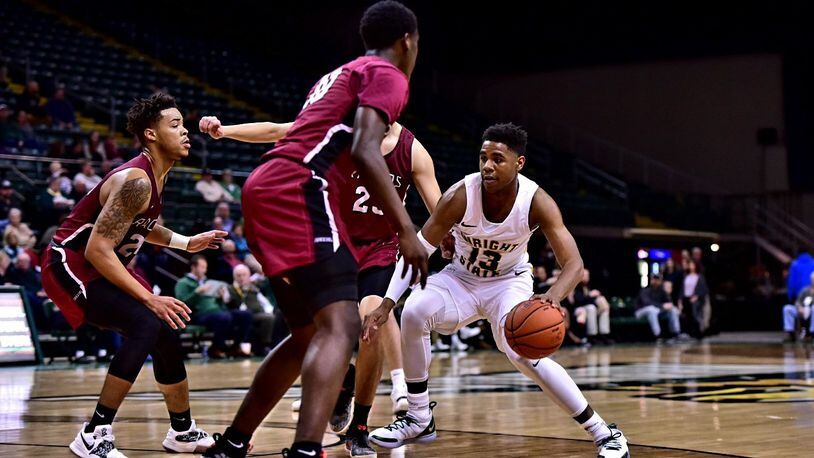Wright State’s Malachi Smith looks for room to manuever during Thursday night’s against Northwestern Ohio at the Nutter Center. Joseph Craven/CONTRIBUTED