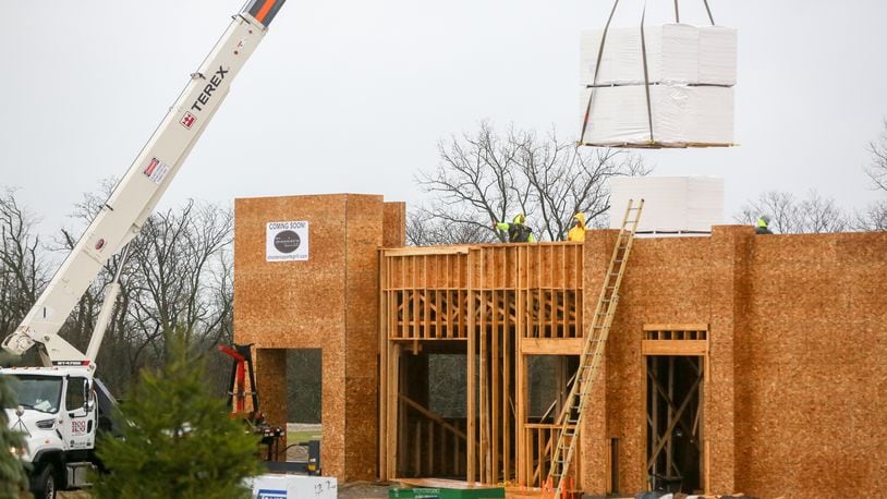 Construction continues March 1 on the new Shooters Sports Grill, located along Ohio 747 in front of the Carriage Hill subdivision in Liberty Twp. The business is expected to open in June. GREG LYNCH/STAFF