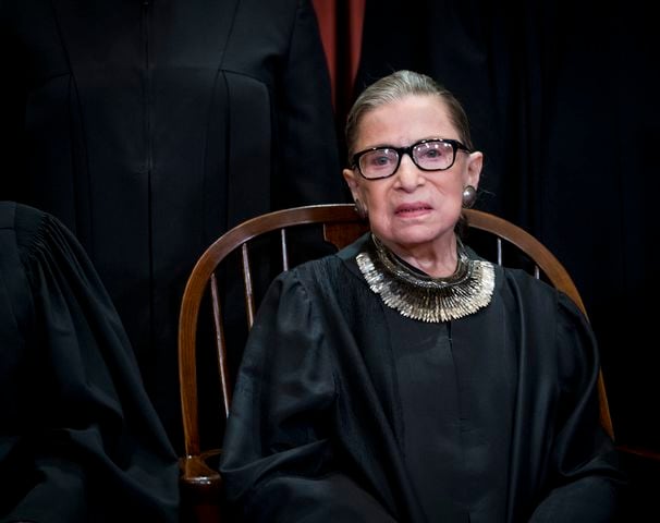 FILE -- Justice Ruth Bader Ginsburg sits for a group photo with her fellow Supreme Court justices, in Washington, Nov. 30, 2018. Ginsburg, the second woman to serve on the Supreme Court and a pioneering advocate for women’s rights, who in her ninth decade became a much younger generation’s unlikely cultural icon, died of complications from metastatic pancreas cancer on Friday, Sept. 18, 2020. She was 87.  (Doug Mills/The New York Times)..