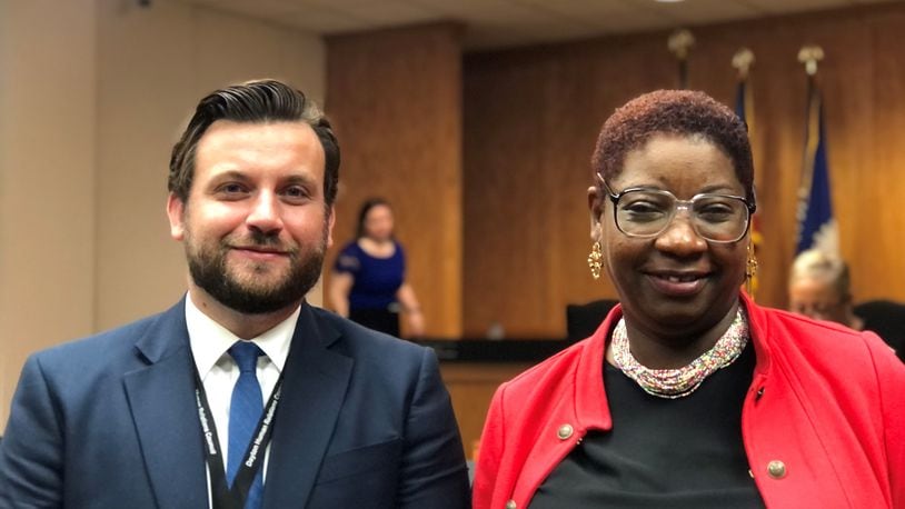 Dayton Human Relations Council staff Jacob Davis and Joann Mawasha at a city commission meeting this month. Davis is the senior civil rights investigator, while Mawasha is the assistant executive director. CORNELIUS FROLIK / STAFF