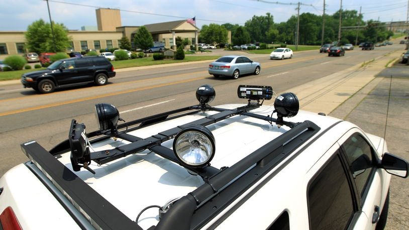 A speed-enforcement van scans traffic along Eaton Avenue in Hamilton. The Hamilton Police Department works with Redflex Traffic Systems to review photographs and video to verify the accuracy of each citation before it is issued.
