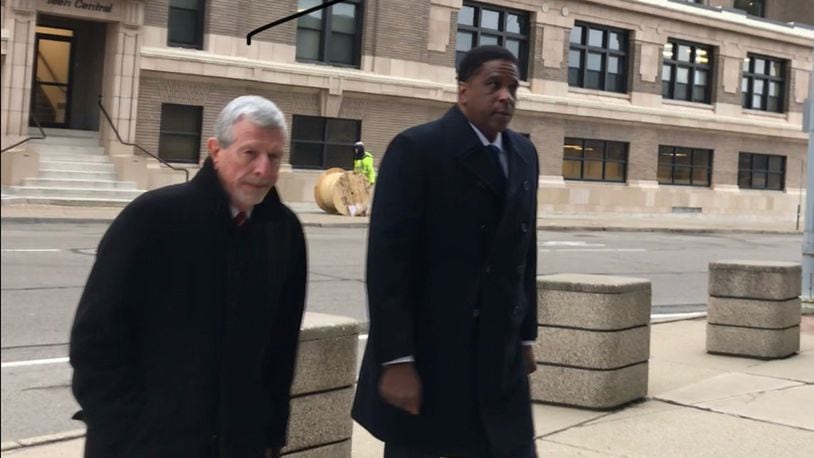 Former Dayton City Commissioner Joey Williams (right) outside the federal building in Dayton Wednesday. Photo by Jim Otte.
