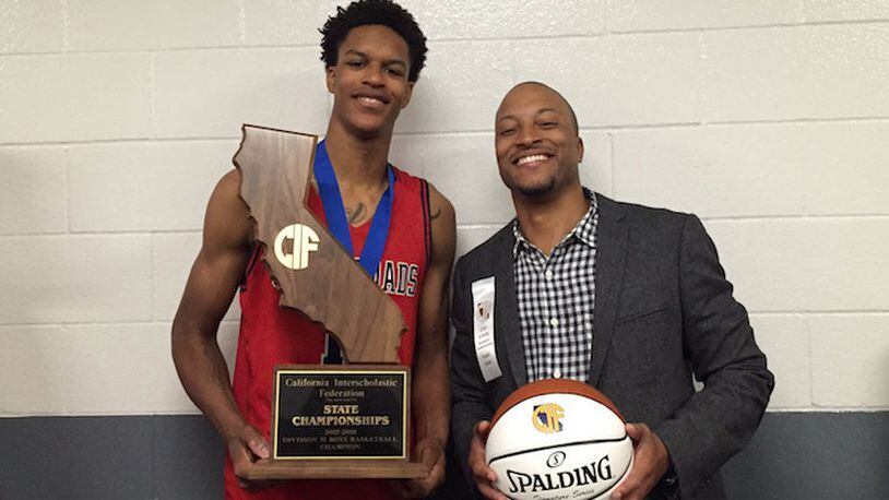 Shareef O'Neal poses with assistant coach Thomas Scott after Crossroads of Santa Monica, Calif., won the CIF State Division II championship on March 23, 2018. (Ailene Voisin/Sacramento Bee/TNS)