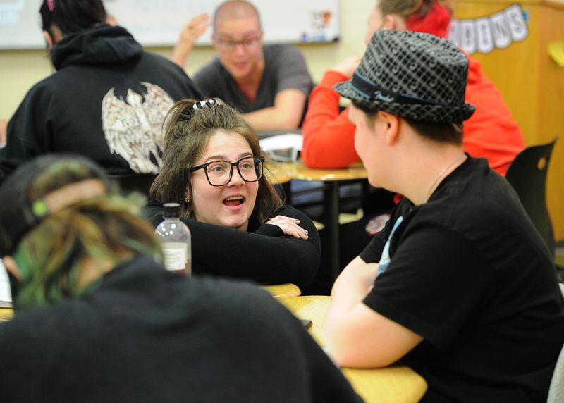 Kaylee Robins, a teacher at Wayne High School, teaches a financial literacy class that won an Ohio State Treasurer's Award last year.  Huber Heights is one of the districts that has a financial literacy course requirement.  MARSHALL GORBYSTAFF