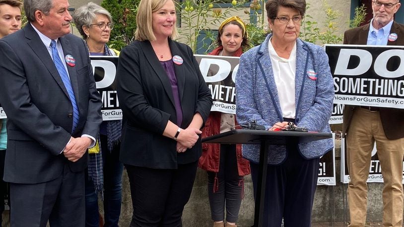 Montgomery County Auditor Karl Keith, left; Dayton Mayor Nan Whaley, center; and state Sen. Peggy Lehner, speak in the Oregon District on Friday at the launch of their “Do Something” campaign. Ismail Turay Jr./Staff