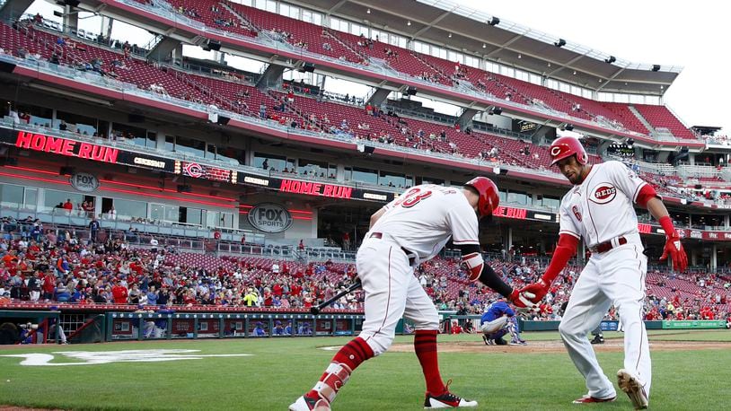 CINCINNATI, OH - MAY 07: Billy Hamilton #6 of the Cincinnati Reds celebrates with Jesse Winker #33 after hitting a solo home run in the third inning against the New York Mets at Great American Ball Park on May 7, 2018 in Cincinnati, Ohio. (Photo by Joe Robbins/Getty Images)