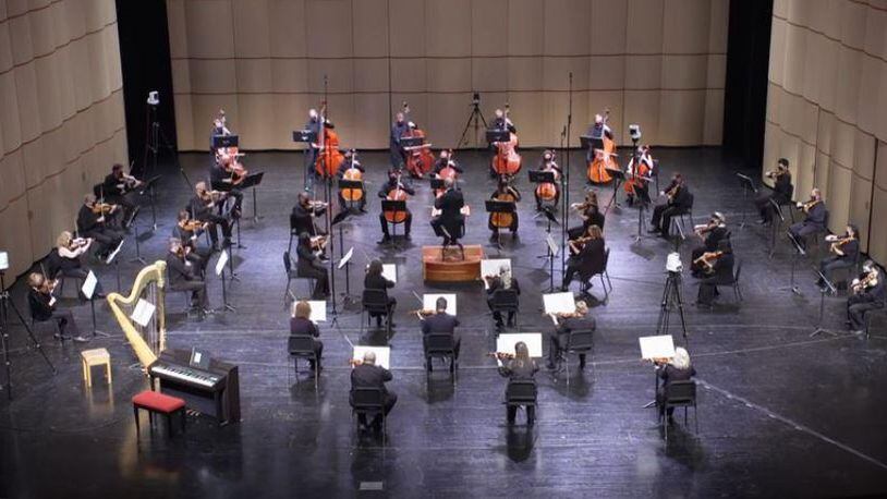 The Dayton Philharmonic Orchestra returns to live in-theatre performance Jan. 23 at the Schuster Center. This photo shows the DPO sitting in a new, socially distanced configuration. CONTRIBUTED