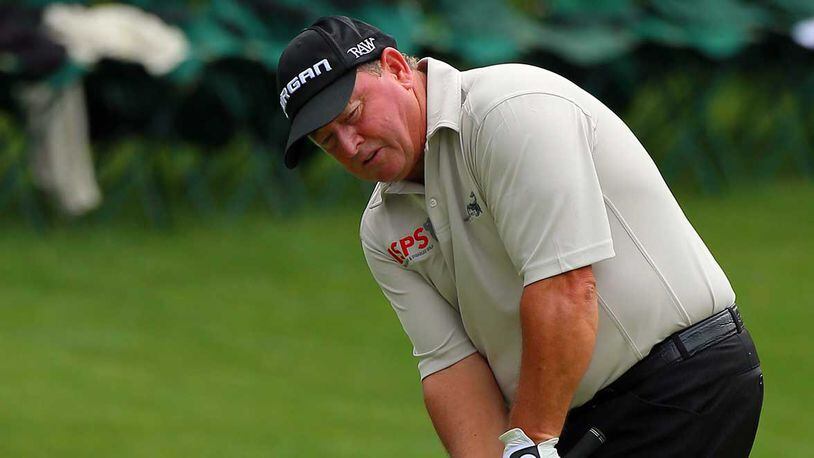 Ian Woosnam hits on the green during the 2013 Masters.