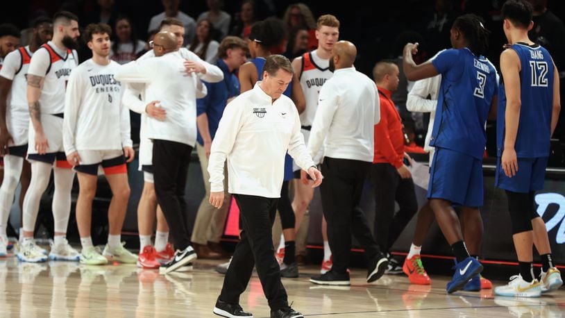 Saint Louis coach Travis Ford leaves the court after a loss to Duquesne in the second round of the Atlantic 10 Conference tournament on Wednesday, March 13, 2024, at the Barclays Center in Brooklyn, N.Y. David Jablonski/Staff