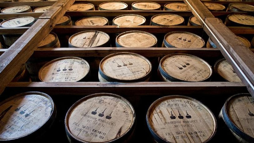 Barrels of bourbon stored at a distillery.