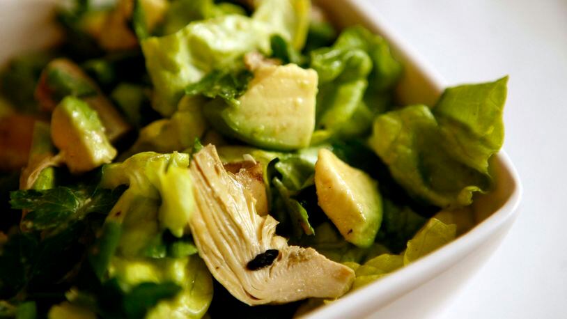 This winter salad contains boston lettuce with avocado and artichokes. (Kirsten Luce/Newsday/MCT)