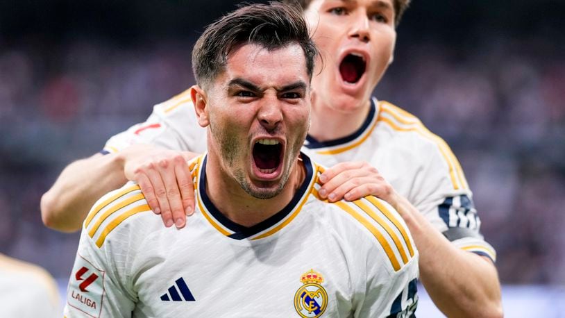 Real Madrid's Brahim Diaz celebrates after scoring his side's opening goal during the the Spanish La Liga soccer match between Real Madrid and Cadiz at the Santiago Bernabeu stadium in Madrid, Spain, Saturday, May 4, 2024. (AP Photo/Manu Fernandez)