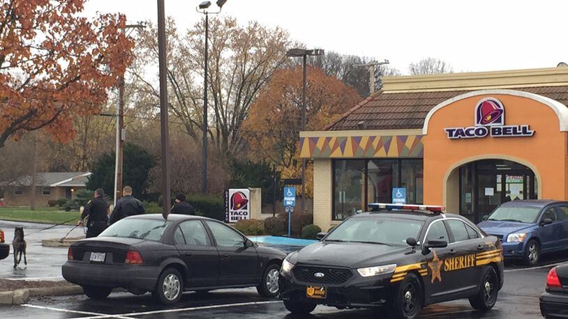 Sheriff’s deputies responded to the Taco Bell on Far Hills Avenue this morning after receiving a report that two armed men robbed the restaurant at gunpoint. JAROD THRUSH / STAFF