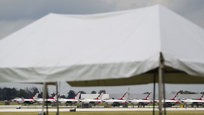 The U.S. Air Force Thunderbirds appear to be under an awning on Wednesday in beforer the Vectren Dayton Air Show this coming weekend. TY GREENLEES / STAFF