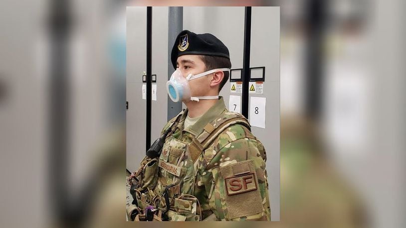 An 11th Security Support Squadron member wears a mask received through a pilot initiative called the Air Force Rapid Agile Manufacturing Platform at Joint Base Andrews, Md., May 15. The framework is designed to keep the Air Force supply system independent of the civilian medical market. (U.S. Air Force courtesy photo)