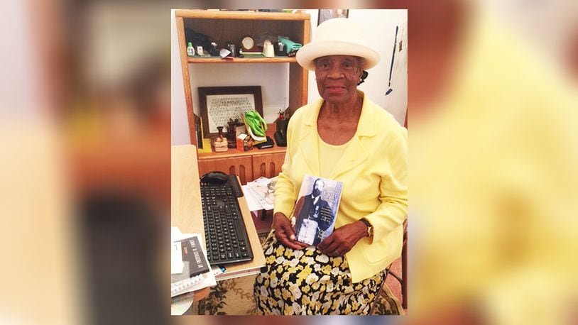 Gladys Turner Finney holds her recently published book about the founder of her Arkansas college, who was an Ohio native and Ohio University graduate. CONTRIBUTED