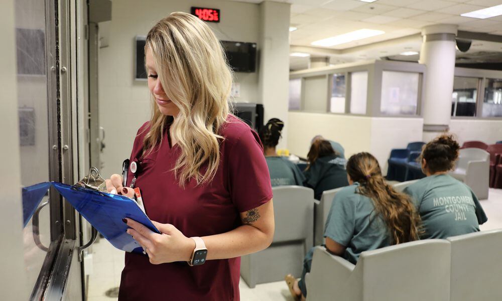 Brittanie Holzfaster, mental health director for NaphCare, Inc. pictured at the Montgomery County Jail in September 2023, where there is limited room to provide inmates with privacy. FILE