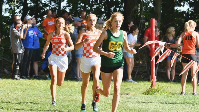 Catholic Central’s Addie Engel (front) shined again in a recent competition. In this photo, she’s surrounded by West Liberty-Salem’s Megan Adams (middle) and Grace Adams (left). Greg Billing / Contributed