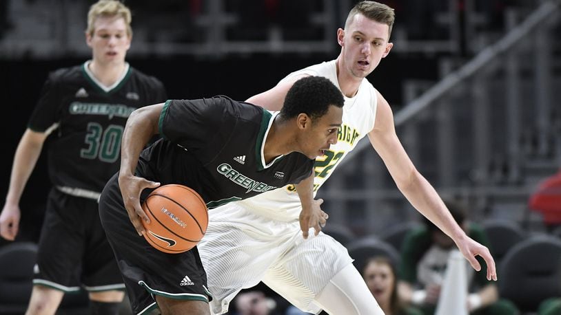 Wright State’s Parker Ernsthausen defends against Green Bay on Saturday night in the Horizon League tournament at Little Caesar’s Arena in Detroit. HORIZON LEAGUE/CONTRIBUTED PHOTO