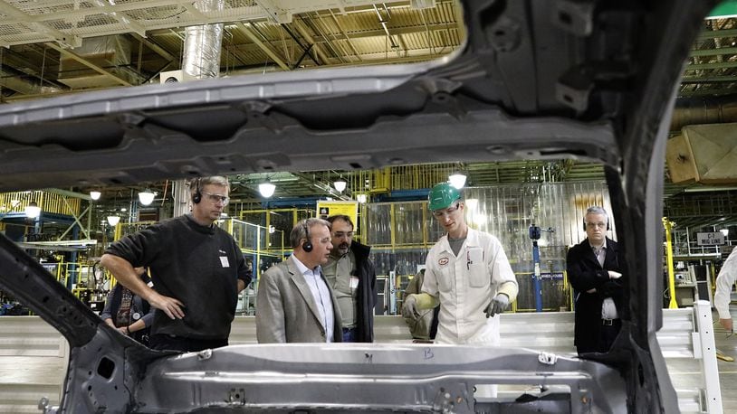 Honda’s Scott King explaines to a group of journalists how the new stronger, lighter frame is made for the new 2017 Honda CRV at their East Liberty plant. Bill Lackey/Staff