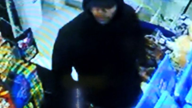 A surveillance video image of a suspect in a recent armed robbery in Middletown. Reports from police departments to the FBI show Dayton had one of the highest burglary rates in the country in 2016, though police say the numbers are misleading. Police say drug use is a big factor in the number of burglaries. Contributed photo.