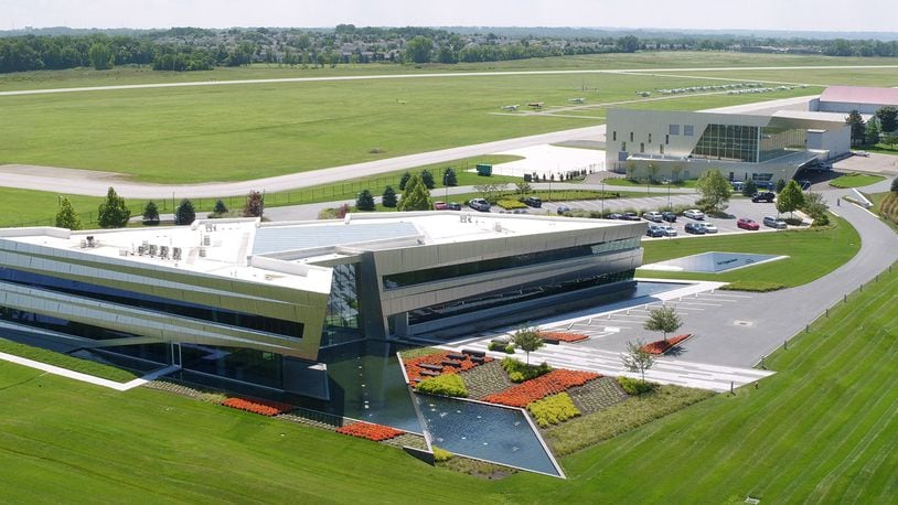 The Connor Group’s headquarters and hangar to its right at the Dayton-Wright Brothers Airport in Miami Twp. combine for more than $20 million in development at the facility. TY GREENLEES / STAFF