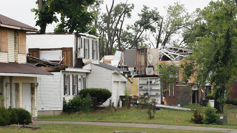 Three months after the Memorial Day tornadoes, little progress has been made on some houses like those in Trotwood on Greenbrook Drive seen Tuesday, Aug. 27, 2019. CHRIS STEWART / STAFF
