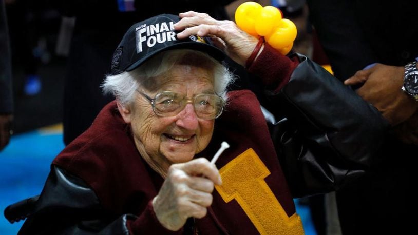 Sister Jean Dolores-Schmidt's image is now emblazoned on T-shirts and socks.