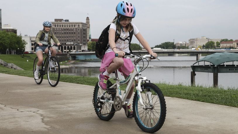 There are plenty of options for riding around the Miami Valley. And it’s important that children (and adults) wear a helmet. CONTRIBUTED/JESSICA HANSBAUER