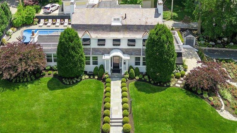 The almost half-acre Oakwood property was featured in the 2023 Garden Tour with its terraced side yard and expanded outdoor living space, complete with an inground swimming pool. Contributed