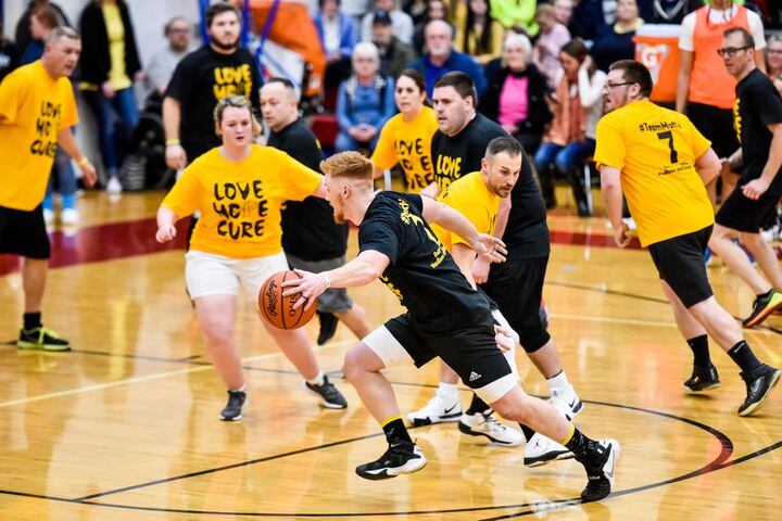 Two Butler County schools hold basketball game to benefit Madison teen battling cancer