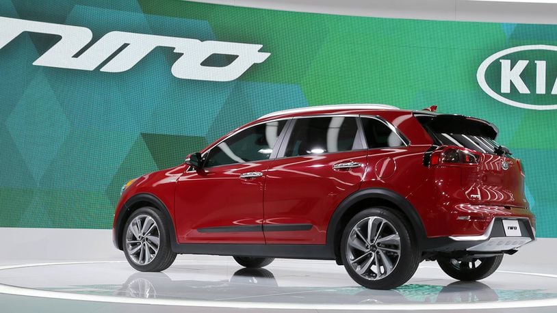 In this Thursday, Feb. 11, 2016, file photo, the 2017 Kia Niro sits on display at the Chicago Auto Show, in Chicago. Kia has claimed the top spot in J.D. Power’s annual initial quality survey of new vehicles for the second straight year. The survey, now in its 30th year, questioned 80,000 owners of 2017 model year vehicles about the problems they had in the first 90 days of ownership. Kia owners had 72 problems per 100 vehicles. The industry average was 97 problems. (AP Photo/Charles Rex Arbogast, File)