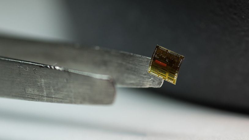 A collaboration between the Air Force Research Laboratory and American Semiconductor has produced a flexible silicon-on-polymer chip with more than 7,000 times the memory capability of any current flexible integrated circuit on the market today. The manufacturing takes advantage of flexible hybrid electronics, integrating traditional manufacturing techniques with 3D electronic printing to create thin, flexible semiconductors that can augment efforts in wearable technology, asset monitoring, logistics and more. (U.S. Air Force courtesy photo).
