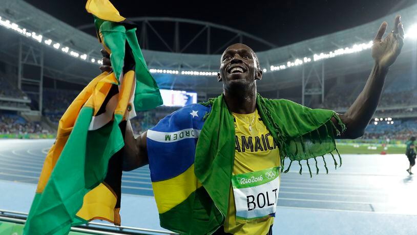 Usain Bolt from Jamaica celebrates after winning the gold medal in the men's 200-meter final, during the athletics competitions of the 2016 Summer Olympics at the Olympic stadium in Rio de Janeiro, Brazil, Thursday, Aug. 18, 2016. (AP Photo/Matt Dunham)