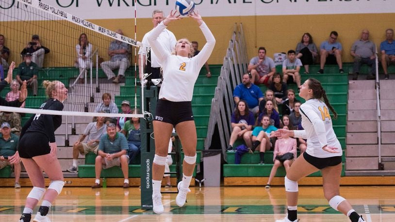Wright State’s Lainey Stephenson (2) sets the ball to teammate Teddie Sauer during an exhibition match against Ohio University last month. The Raiders opened their season with a win at Notre Dame. PHOTO COURTESY OF WRIGHT STATE ATHLETICS