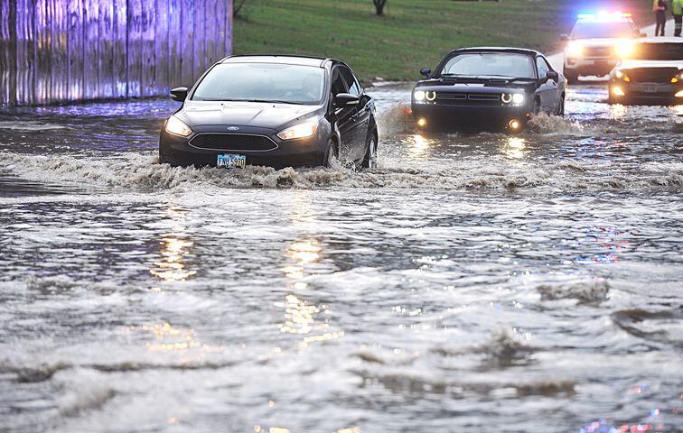PHOTOS: First spring storms cause flooding, damage
