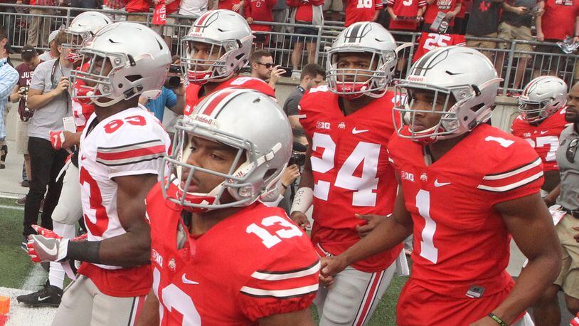 Ohio State takes the field at Ohio Stadium before the spring game on Saturday, April 15, 2017, in Columbus. David Jablonski/Staff