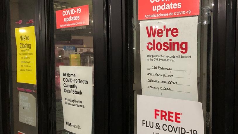 Signs on the door of the CVS Pharmacy at 524 E. Stroop Road in Kettering indicate the store would close on Feb. 10. The store is one of several that has closed in the Dayton area this year.
