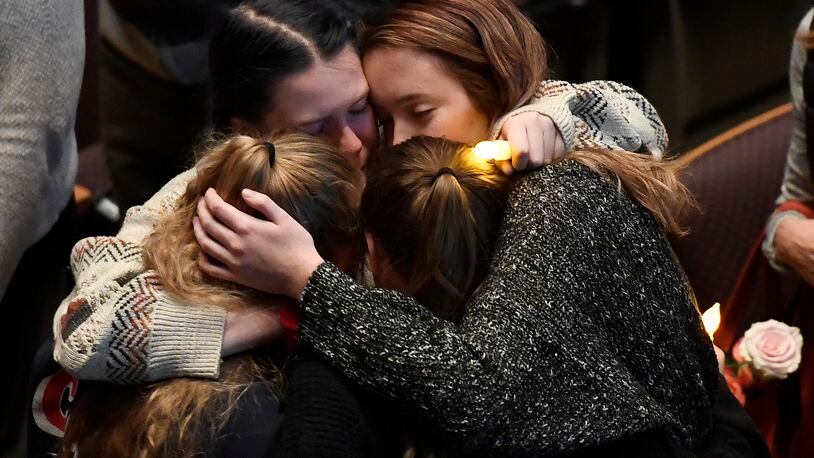 THOUSAND OAKS, CA - NOVEMBER 08: Mourners cry and comfort each other during a vigil for the victims of the mass shooting at the Thousand Oaks Civic Arts Plaza on November 8, 2018 in Thousand Oaks, California. Twelve people including a Ventura County Sheriff sergeant and the gunman died in the mass shooting at Borderline Bar and Grill . (Photo by Kevork Djansezian/Getty Images)