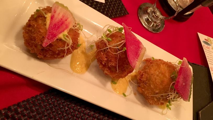 This arroz con pollo arancini  dish was among those served at Barcelona Tapas at El Meson in West Carrollton.   Photo: Amelia Robinson