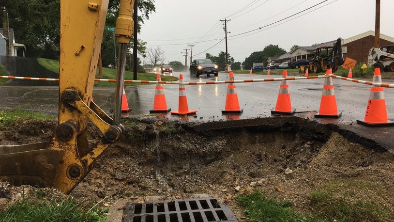 Starting after July 4, a portion of Dayton-Xenia Road will be closed for 10 days to accommodate the installation of a culvert near Woods Drive in Beavercreek. A larger project will affect the road for about a year. RICH WILSON/STAFF