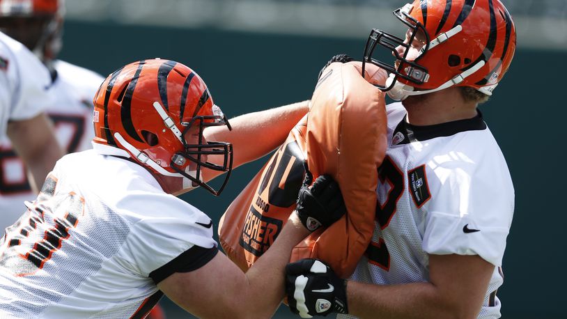 CINCINNATI, OH - MAY 12: Offensive linemen Tanner Hawkinson #72 and T.J. Johnson #60 of the Cincinnati Bengals work out during a rookie camp at Paul Brown Stadium on May 12, 2013 in Cincinnati, Ohio. (Photo by Joe Robbins/Getty Images)