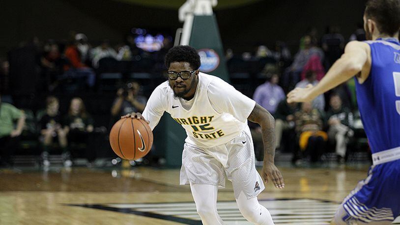 Wright State’s Tye Wilburn drives during a game vs. Urbana at the Nutter Center. Tim G. Zechar/Contributed photo