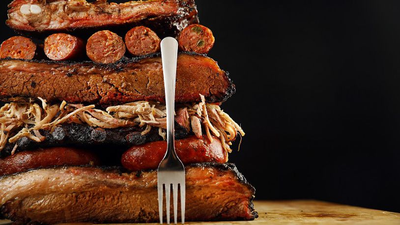 Brisket, ribs, sausage, and pulled pork are piled high, Thursday, July 12, 2018. Barbecue can be part of the keto diet. (Food styling by Michael Hamtil) (Tom Fox/The Dalals Morning News/TNS)