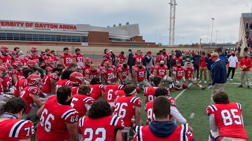 Dayton coach Rick Chamberlin talks to the team after the final football spring scrimmage against Ashland on April 17, 2021, at Welcome Stadium. David Jablonski/Staff