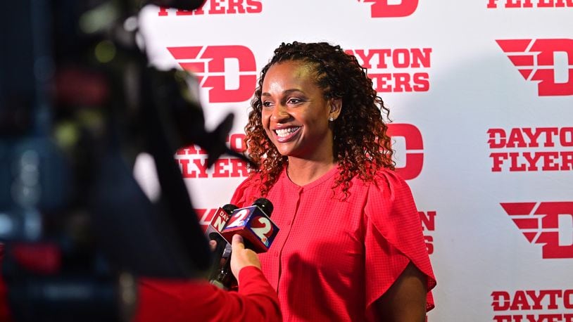 Tamika Williams-Jeter talks to reporters at a press conference at UD Arena on Monday, March 28, 2022, as she's introduced as the new Dayton women's basketball coach. Photo by Erik Schelkun